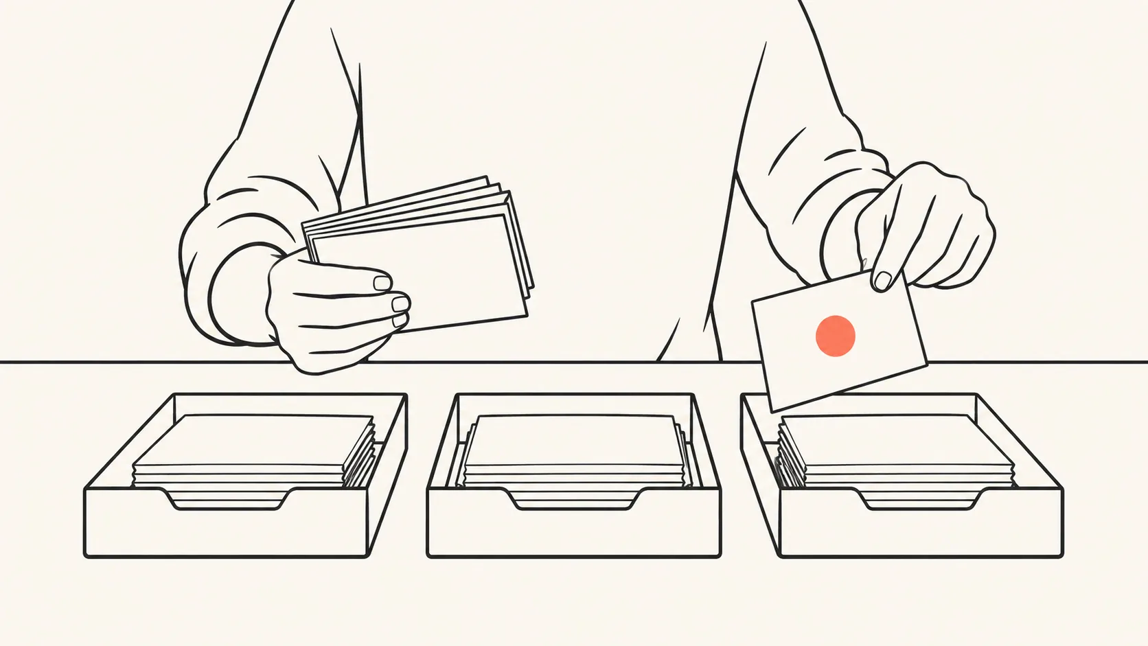 A hand sorting index cards of different sizes into labelled trays, one card set apart with a coral marker